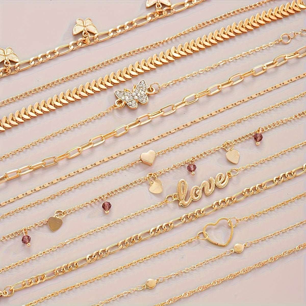 13-piece stylish golden-toned anklet set with love and butterfly charms, adjustable lengths for women's foot jewelry. Perfect for daily wear, dates, vacations, anniversaries, and