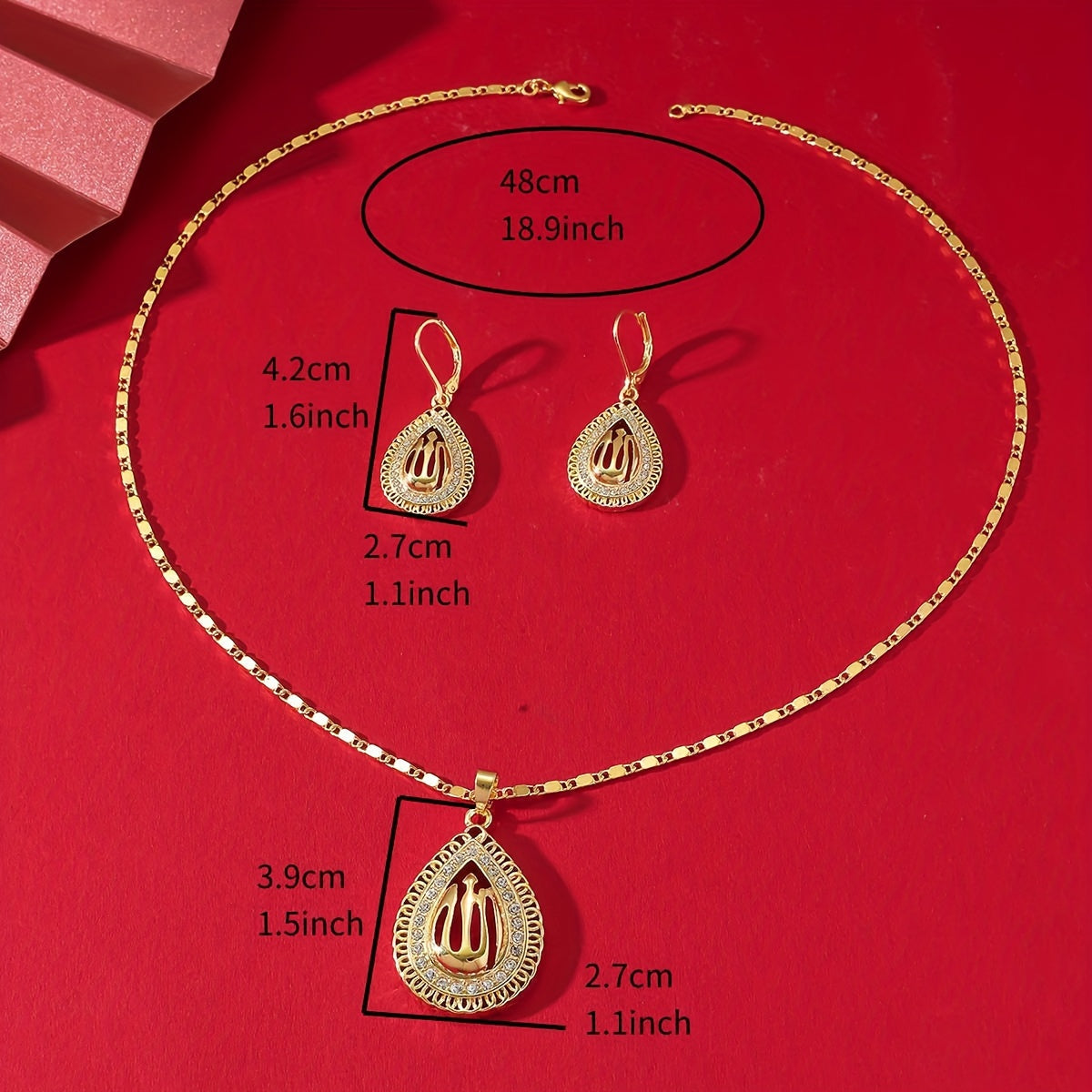 A jewelry set featuring a pendant necklace and earrings in Middle Eastern luxury style, with a golden water drop shape and interlaced lines design featuring a hollow Allah pattern.