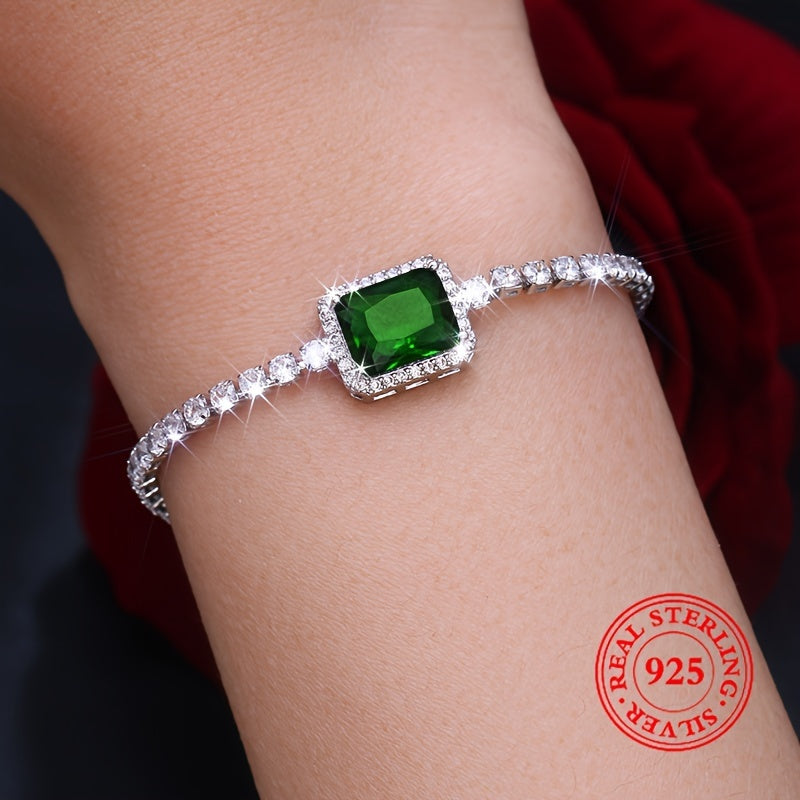 An elegant and luxurious women's bracelet featuring dazzling green Zirconia stones, crafted in adjustable 925 silver weighing just 4.3g. Perfect for daily wear, special occasions, and gifting, especially for Middle Eastern events.