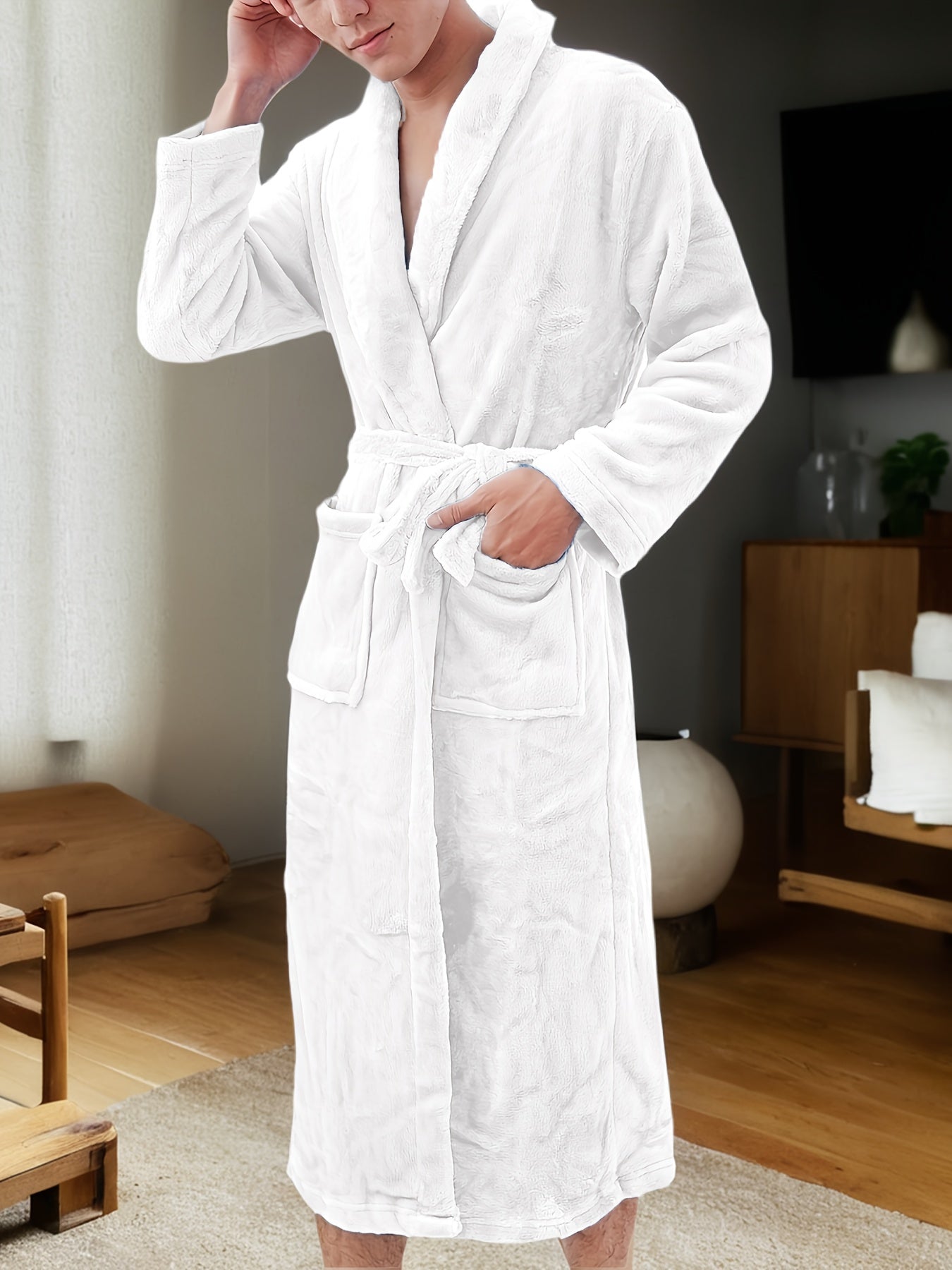 Soft white fleece bathrobe for men with pockets, V-neck, long sleeves, belted waist, and cozy kimono style for home & spa.