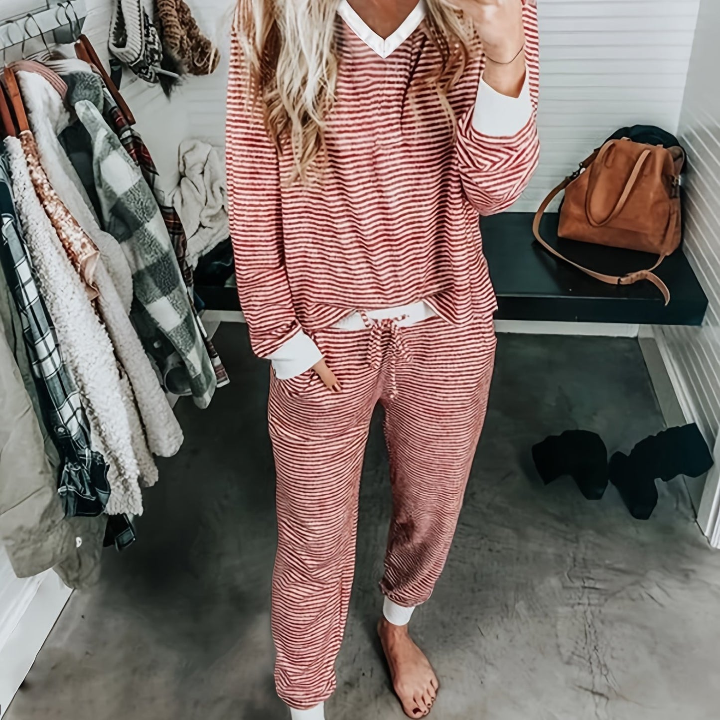 Striped V-neck knit loungewear set with long sleeves and pants.