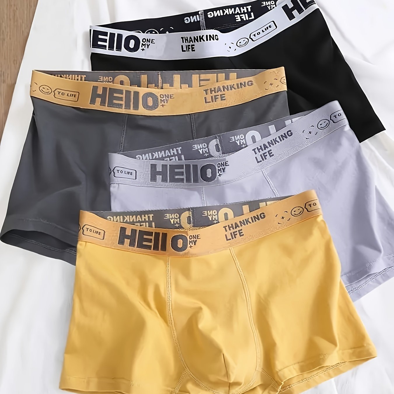 4 pack of men's trendy boxer shorts, breathable and comfortable, stylish and fashionable underwear.