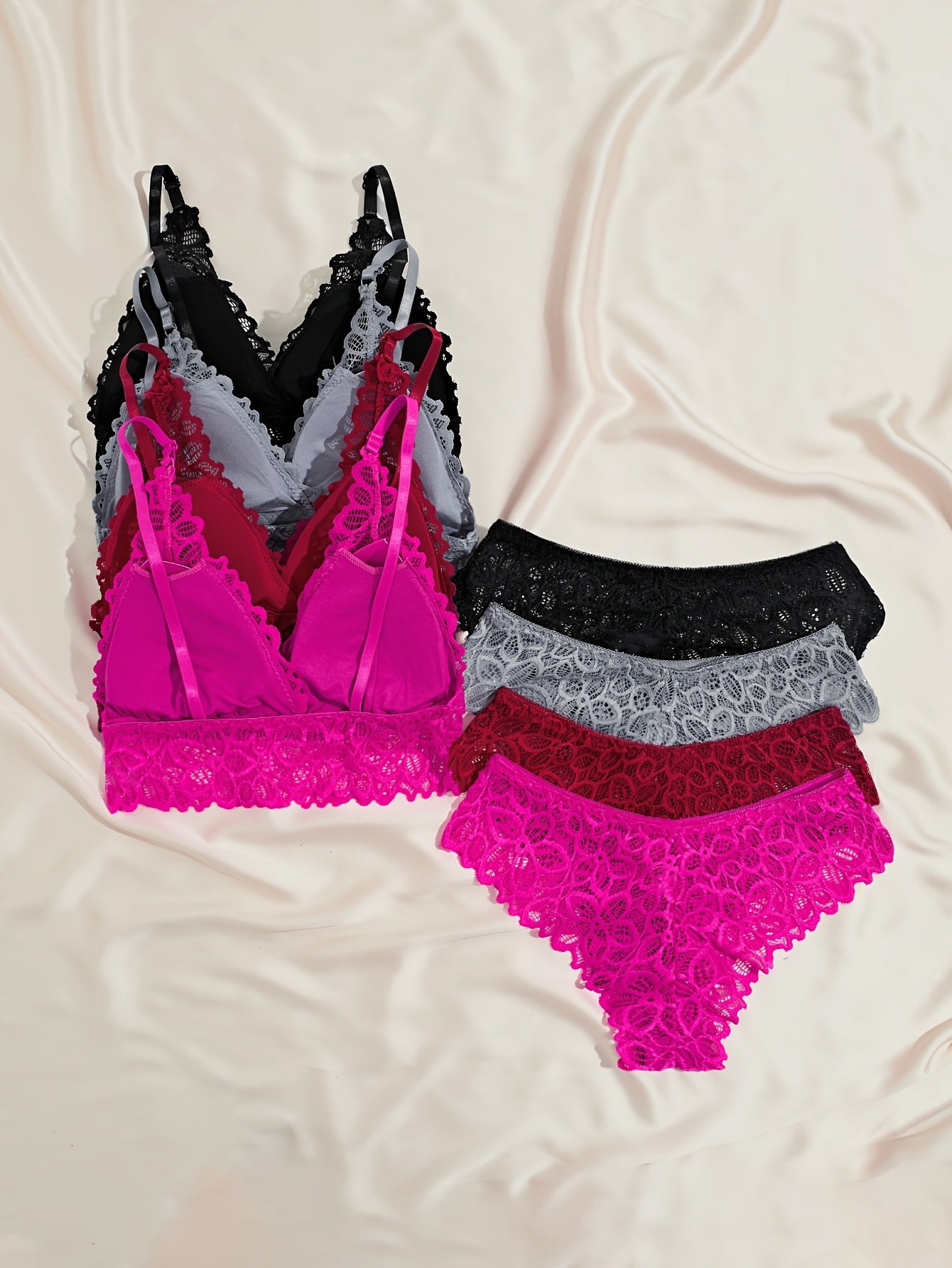 Sexy lingerie set with solid floral lace cami bra, matching panties, for women.