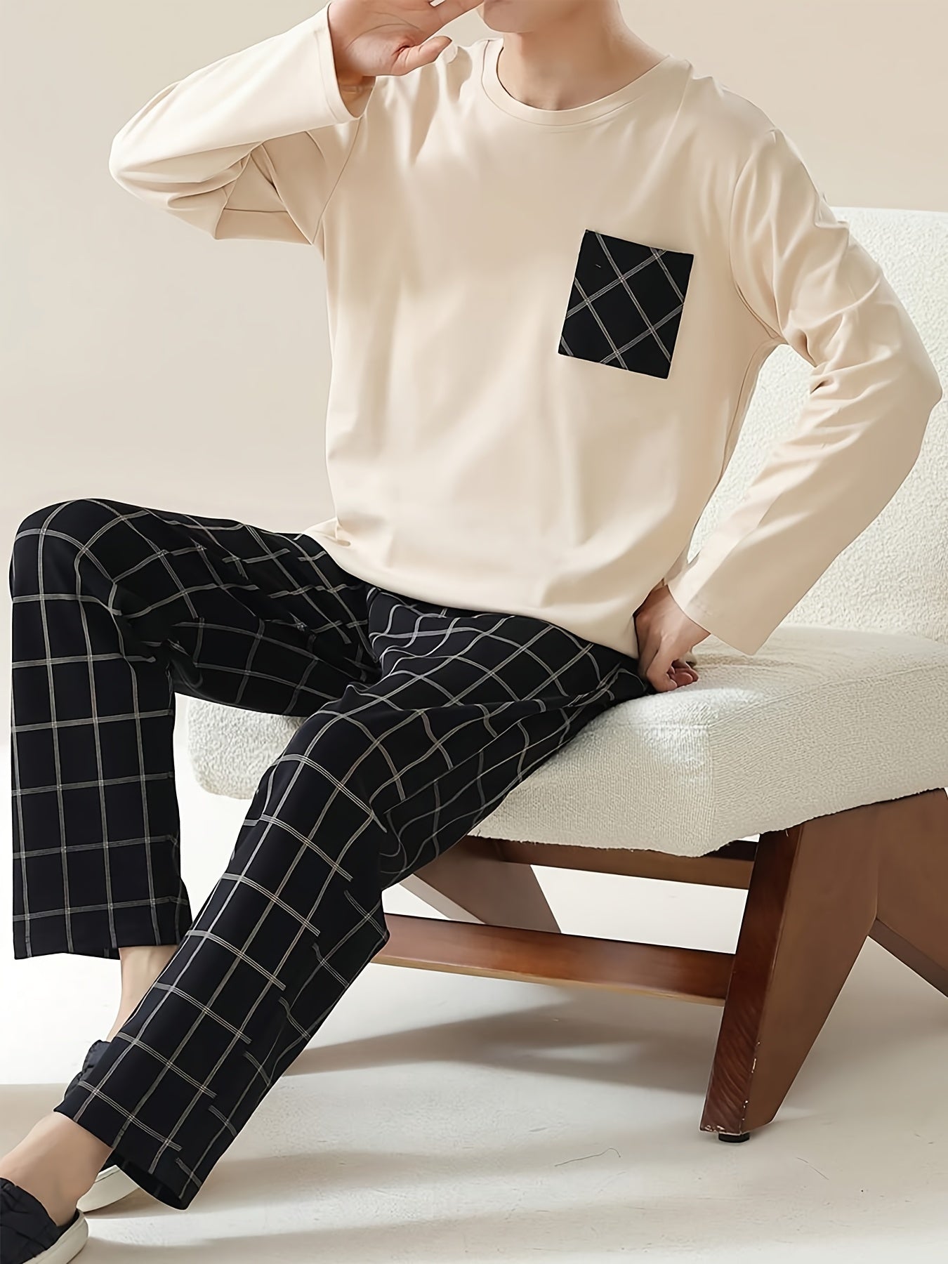 Men's beige long sleeve pullover with pocket, plaid pants in a soft and comfortable sleepwear set. Casual style, regular fit in knit polyester blend fabric - perfect for all seasons.