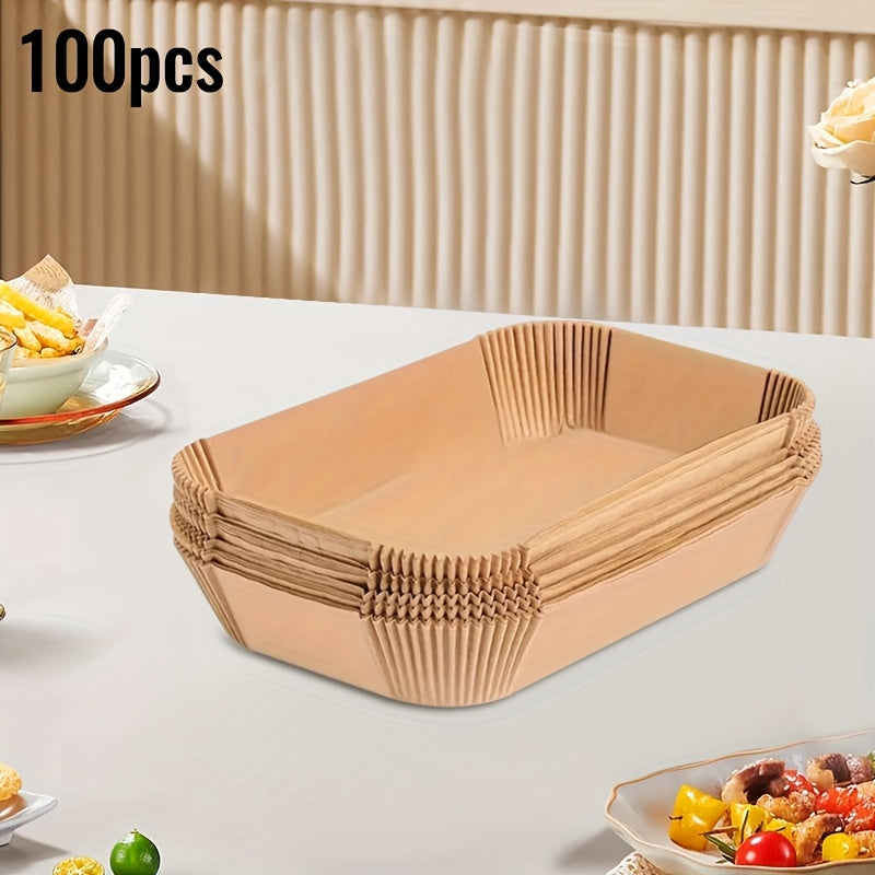 Large rectangular silicone paper air fryer liners available in 50 or 100 pieces. Non-stick, easy to clean, space-saving design. Oven safe and disposable paper baskets for baking, cooking, and serving food. A must-have kitchen tool for home chefs.