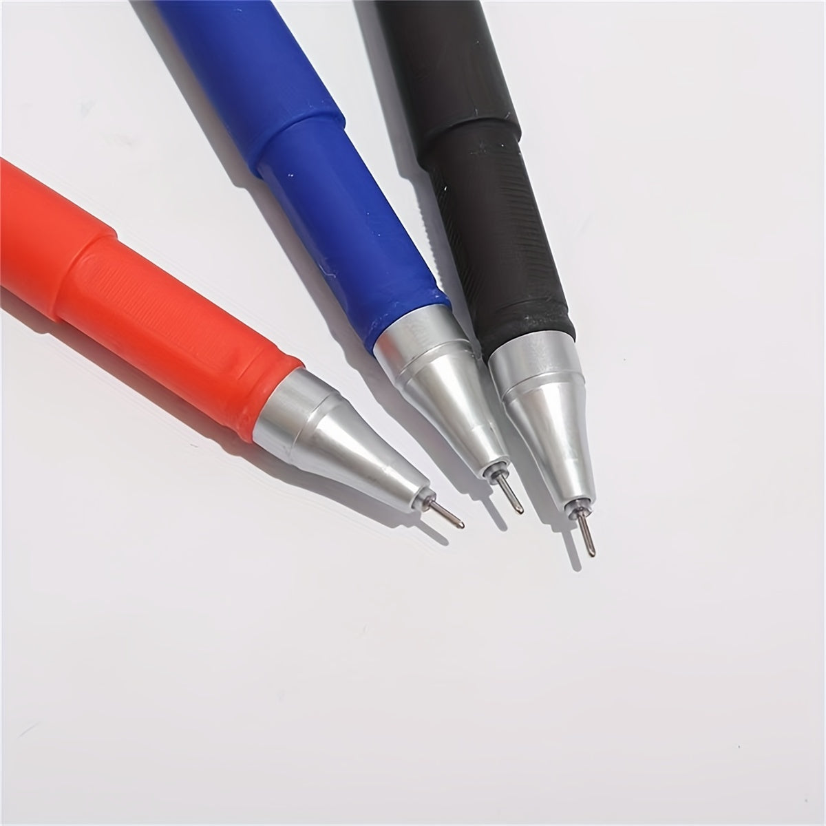 18-piece gel pen set in black, blue, and red ink colors with 0.5mm ballpoint tips, ideal for students and office use.