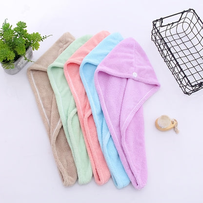 Super absorbent hair towel made of soft and water-absorbing microfiber with anti-frizz and anti-static features, perfect for bathroom use. Made of 100% polyester.