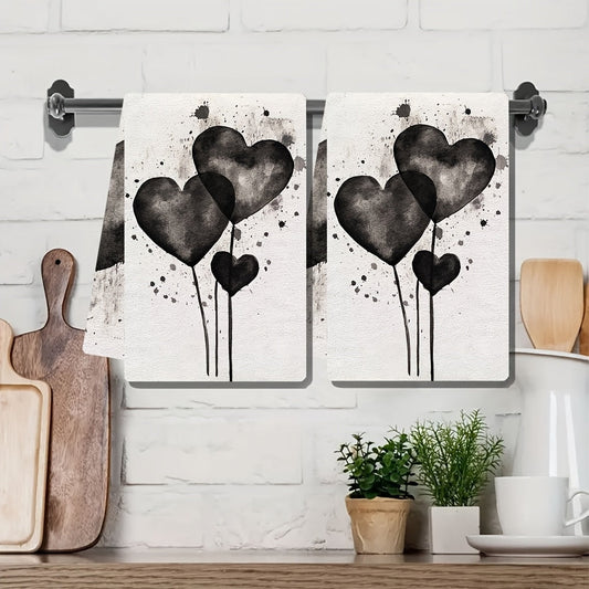 2 pieces of ultra soft kitchen towels featuring a Valentine's Day watercolor black and white heart design. These highly absorbent dish hand towels are perfect for holiday decor. They are machine washable and measure 16x24 inches. (SKU: 2KYSYS1217670)