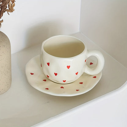 Handcrafted ceramic coffee mug and saucer set with whimsical patterns. Reusable and recyclable, perfect for tea or latte. Hand wash only.