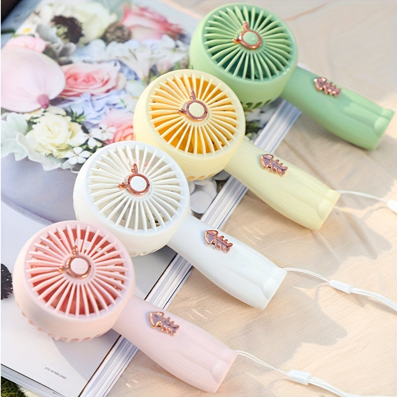 Stay cool this summer with the TOOP Cartoon Mini Handheld Fan! This adorable fan features a built-in light, durable ABS material, and a USB rechargeable 500mAh lithium battery. Perfect for on-the-go or desktop use, this portable fan makes a cute and