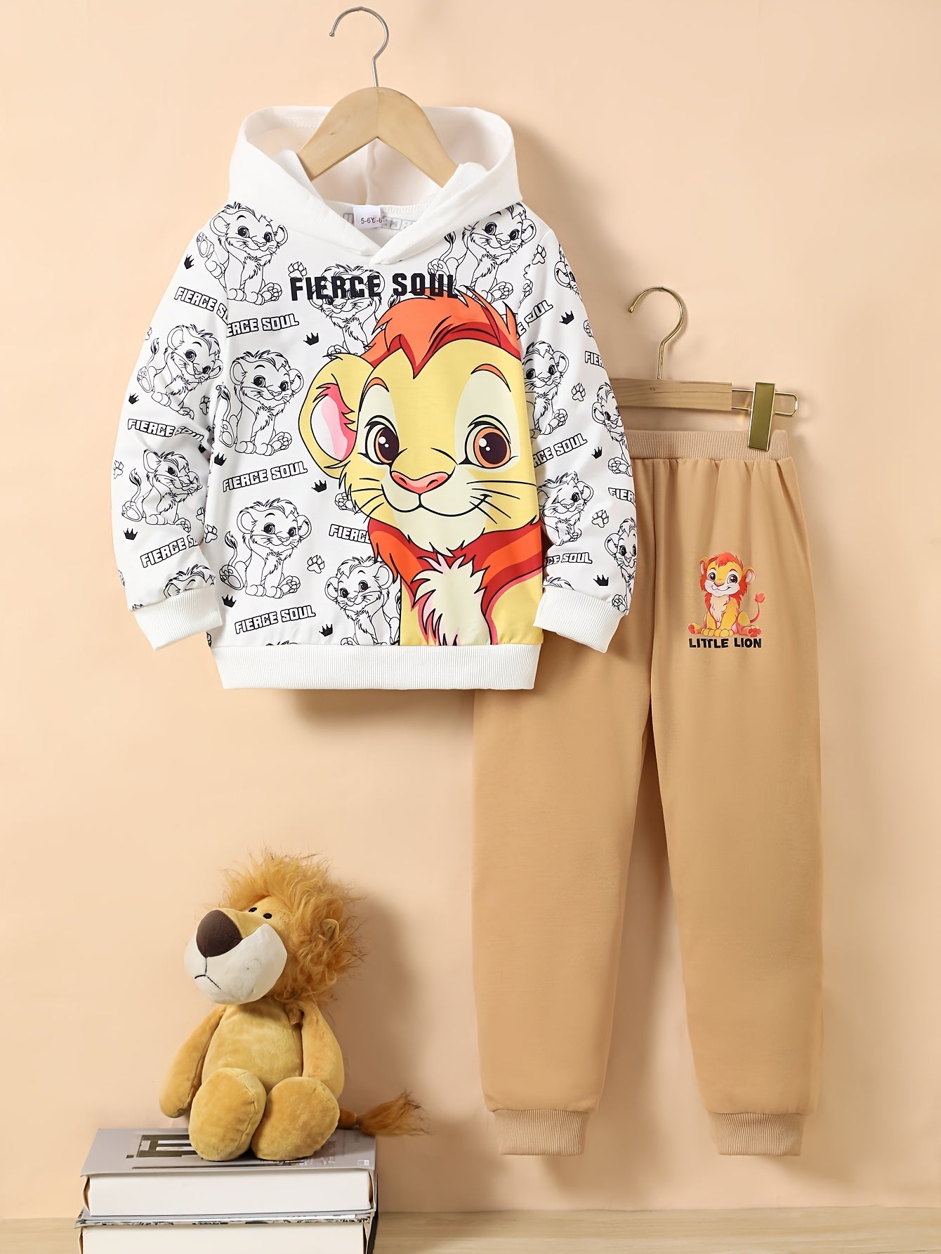 Trendy boys' lion print hoodie and sweatpants set for fall/winter, ideal for outdoor play.