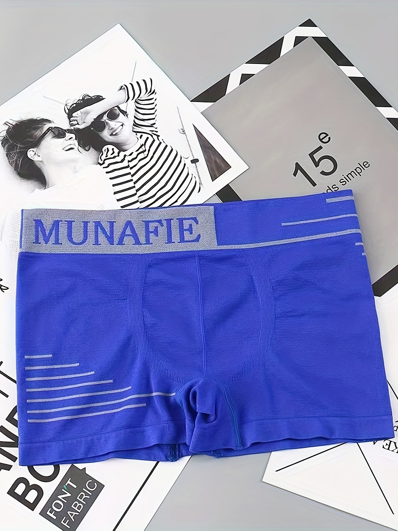 12pcs Men's Seamless Boxer Briefs in red, black, blue, and white with "MUNAFIE" print. Sizes S & M available. Breathable, quick-dry, stretchy fabric for everyday comfort.