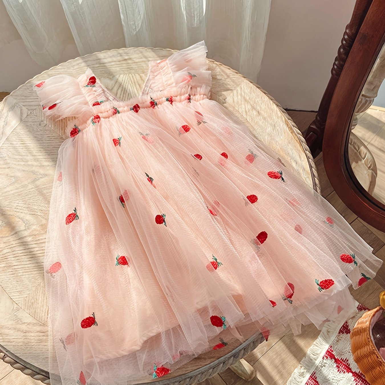 Cute girls' pink cherry embroidered summer dress with ruffled sleeves and tulle skirt - perfect for parties and beach outings. Made of lightweight polyester for a casual straight-cut fit.