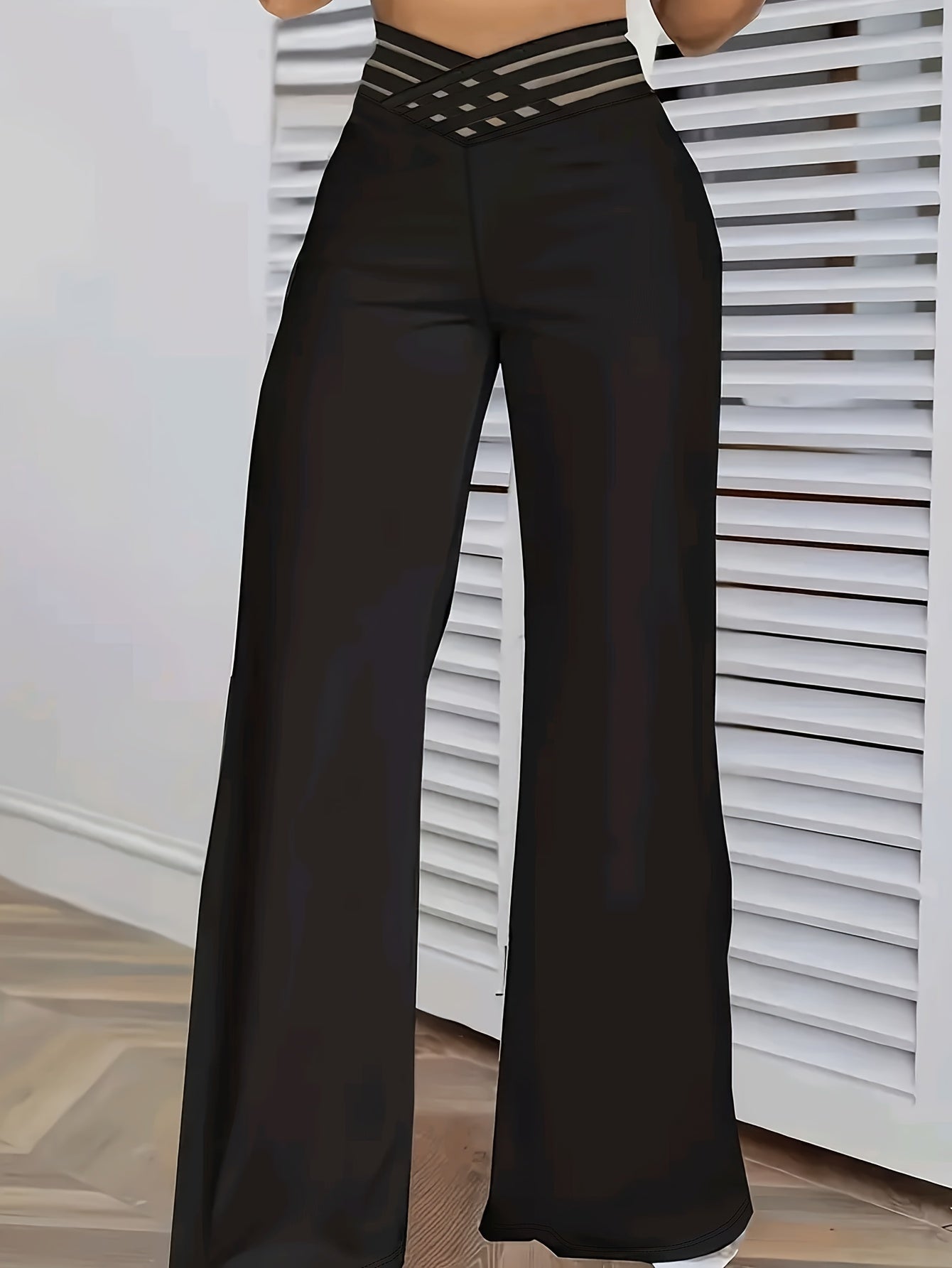 Elegant wide-leg pants for women with a waistband design, solid color, and made from polyester fabric. Suitable for all seasons in adult size and woven material.