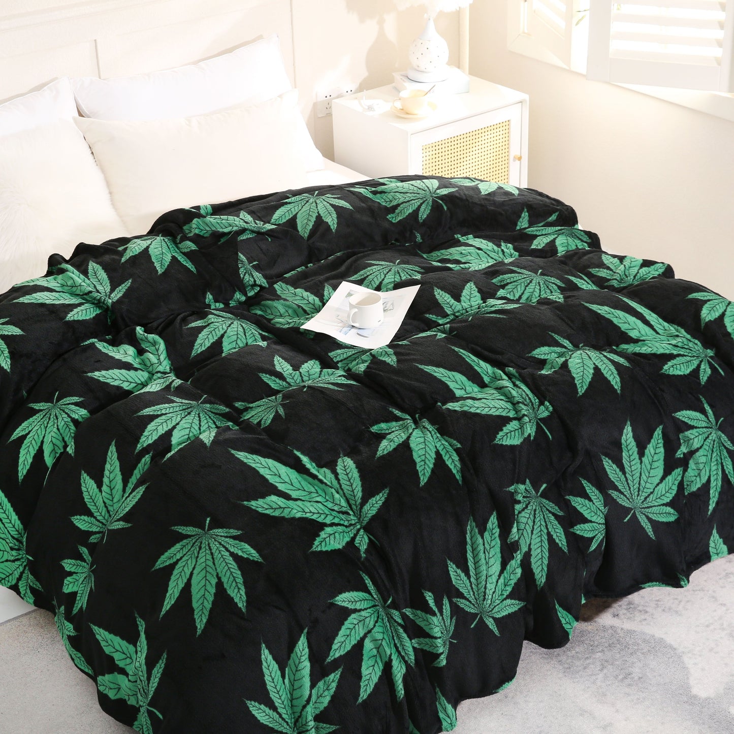 Country-rustic style flannel blanket featuring a marijuana leaf print. This soft and warm knitted throw is perfect for couches, sofas, offices, beds, camping, and travel. Made of 100% polyester, it is machine washable and suitable for all seasons.