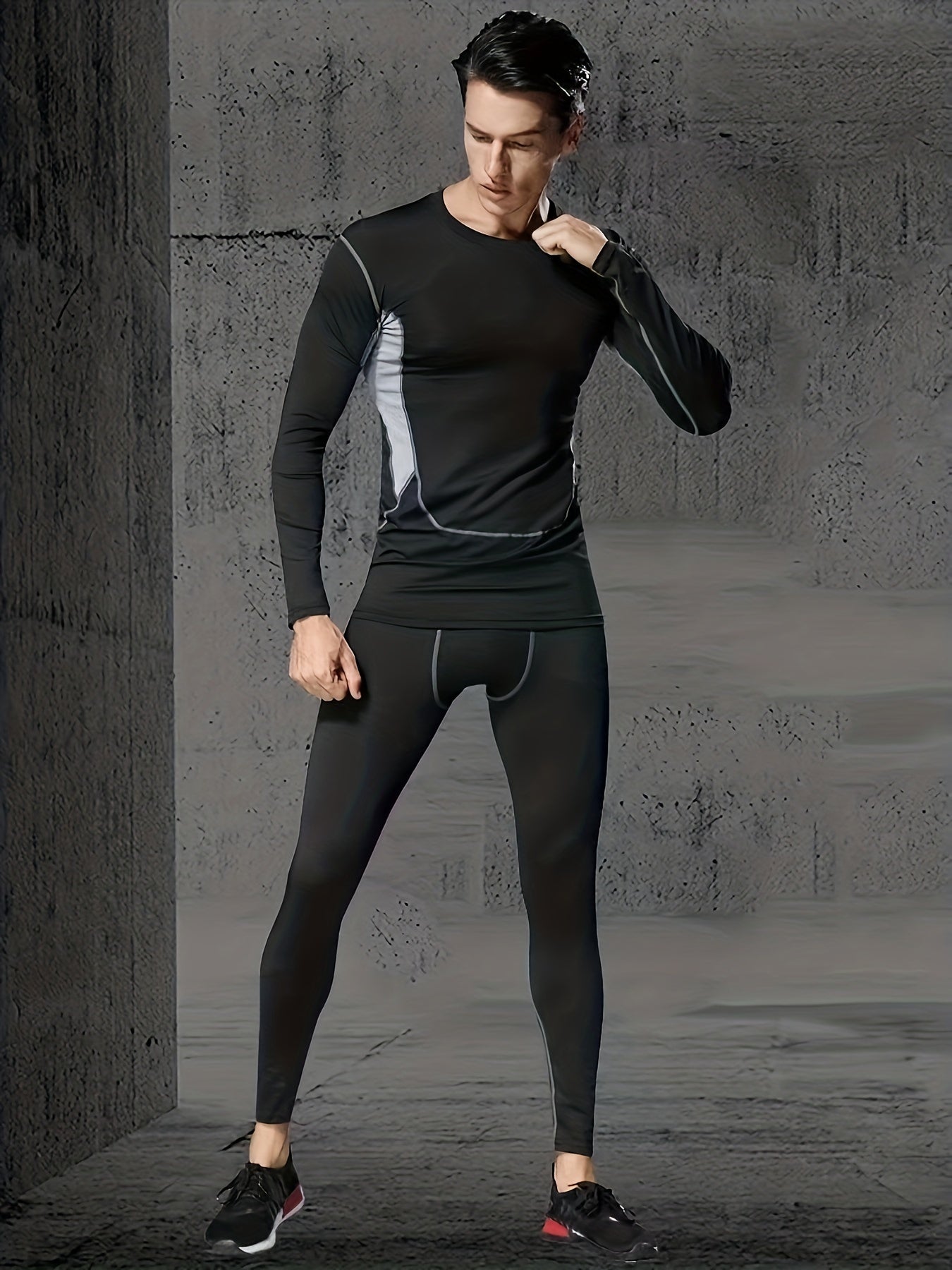 Men's tight sportswear set for gym workouts and running, featuring breathable long sleeve shirts and indoor workout pants.