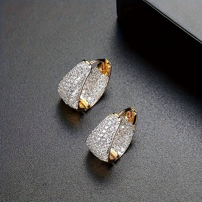 Stylish and versatile earrings adorned with sparkling zirconia, ideal for giving as a gift to friends or loved ones during the holiday season.