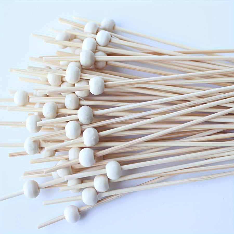 100 high-quality bamboo cocktail picks with red beads - disposable fruit skewers for parties, bars, desserts, and outdoor gatherings.