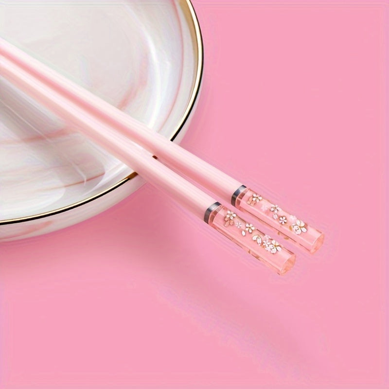 Five pairs of pink alloy chopsticks with cherry amber, perfect for home dining in Chinese and Korean style, ideal for fast food, noodles, sushi sticks, and ramen.