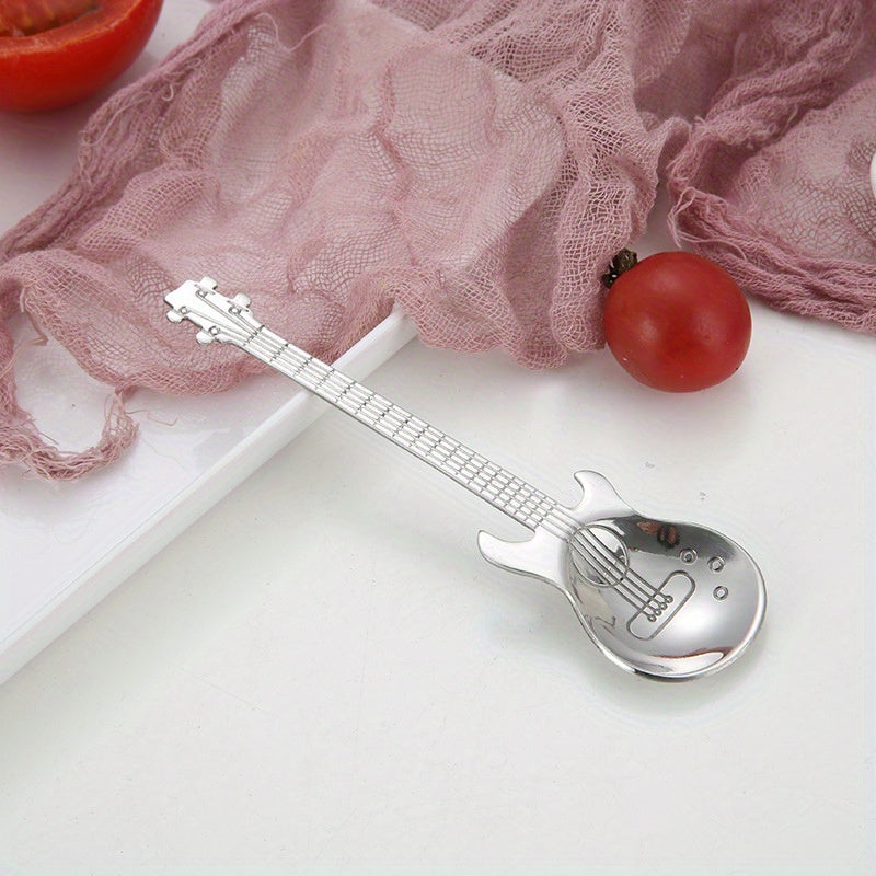 Titanium-plated stirring spoon with a creative guitar-shaped handle, ideal for use in ice bars or music bars. Made of durable stainless steel.