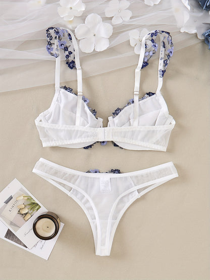 Stylish lingerie set for women with floral embroidery - padded bra and sheer thong, ideal for fall/winter.