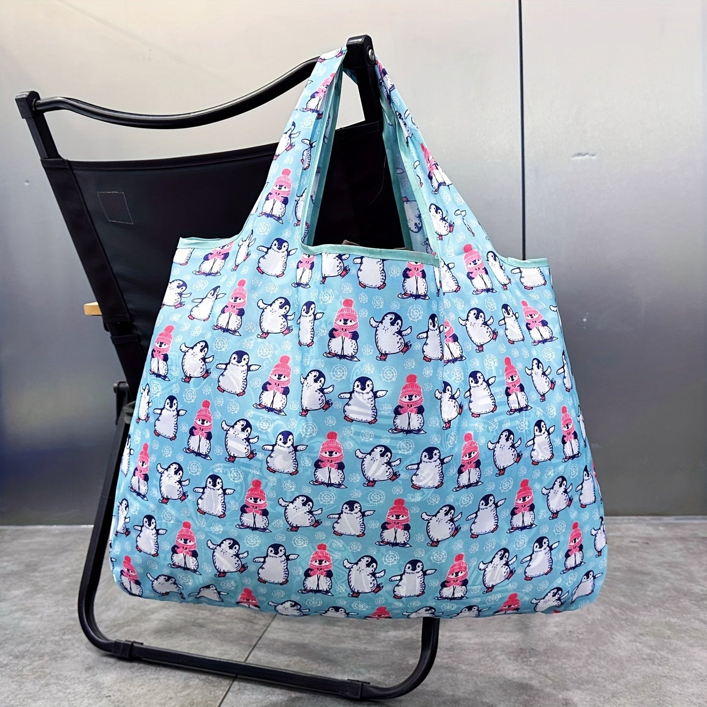 Durable and Lightweight Penguin Pattern Tote Bags - Perfect for Shopping, Groceries, and Everything in Between! These reusable and foldable totes are also recyclable, water resistant, and compact enough to fit in your pocket.