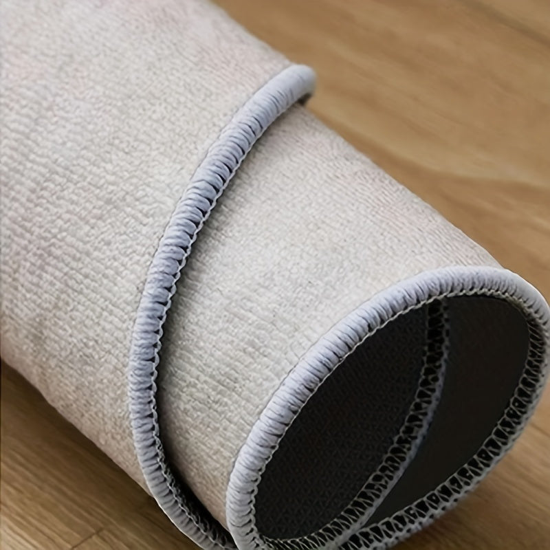 Desk Mat made of ultra-soft polyester fiber, featuring a non-slip rubber backing and knit weave design. Hand washable and soundproof, perfect for protecting floors and adding style to your home office.