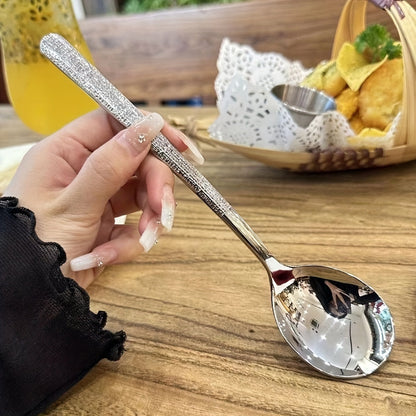 Upgrade your dining experience with our elegant New Light Luxury Hammer Pattern Stainless Steel Spoons. Available in sets of 4pcs, 8pcs, 12pcs, and 15pcs, these spoons are perfect for use in restaurants, for main course meals, for everyday use at home