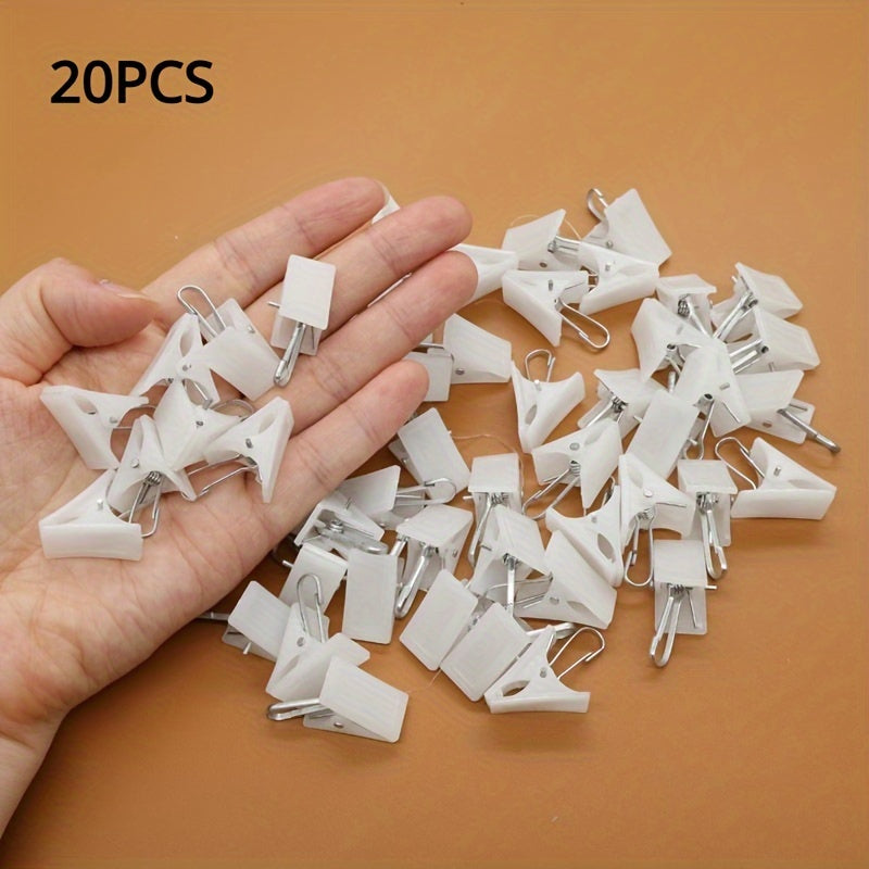 This 20-piece set of white plastic clothespins is ideal for hanging curtains, bathrobes, and other items. Please note that these clothespins should be hand washed only.