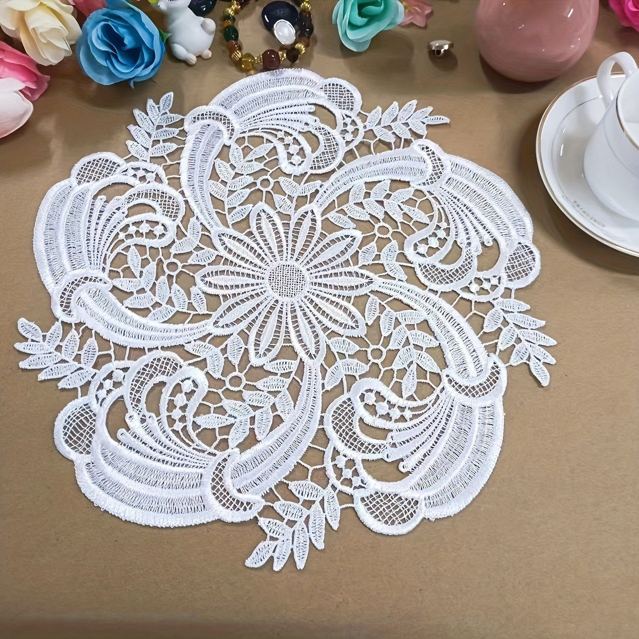 Elegant European lace coaster set for table protection.