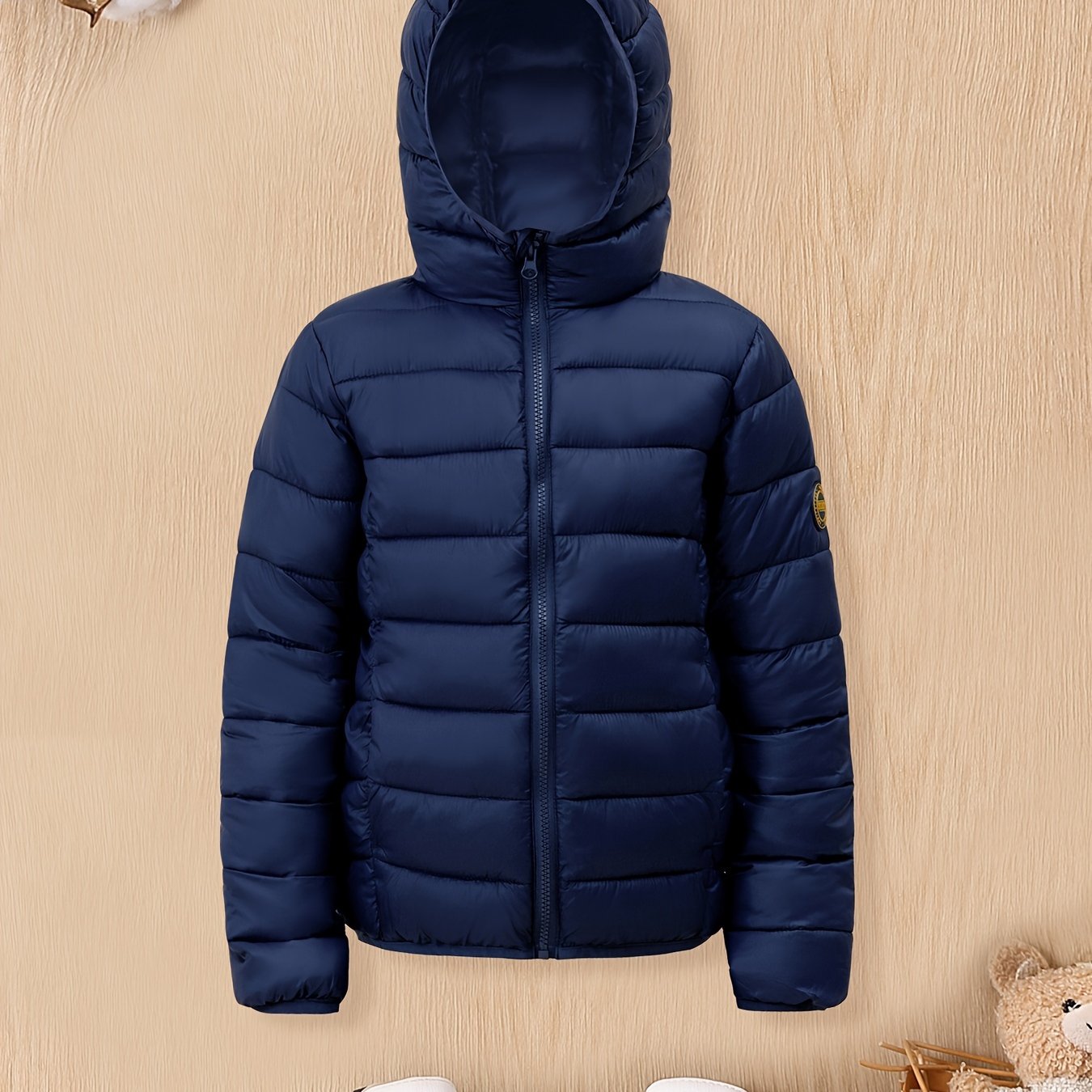 Boys' cozy hooded zip-up coat ideal for chilly weather.