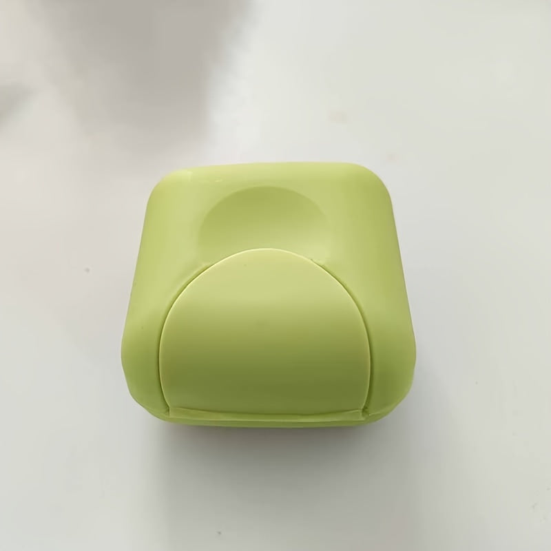 Plastic soap box with lid for travel, camping, or gym use. Waterproof and portable. Perfect for storing soap on the go.