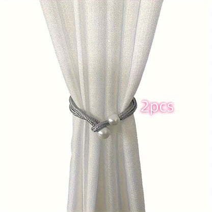 Fashionable and simple curtain binding rope available in 1 piece or 2 pieces. This decorative rope features creative pearl accents, adding beauty to your curtains. Use it as a decorative curtain buckle or binding strap for a simple and elegant touch.