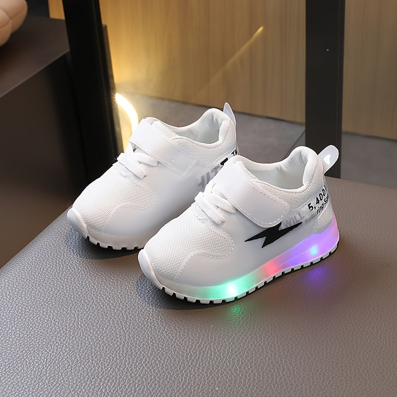 LED light-up sneakers for kids with breathable fabric and non-slip rubber sole, ideal for all seasons.