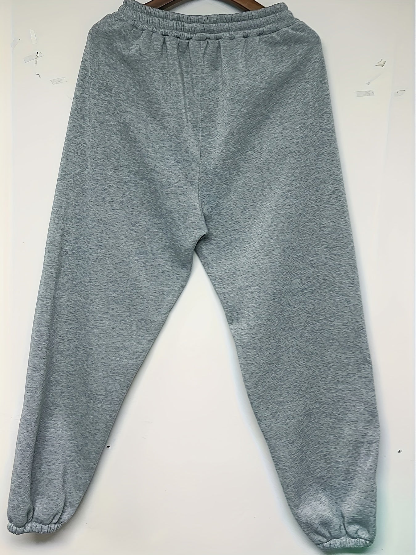 Casual women's drawstring jogger pants in a solid color.