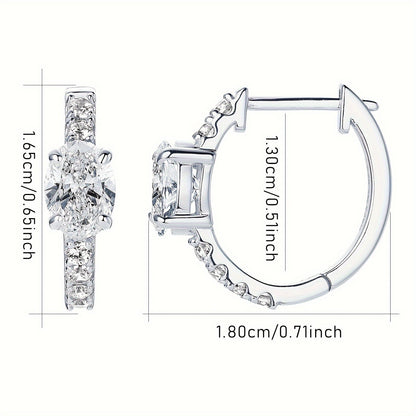 These stunning earrings feature a pair of Moissanite stones set in 925 pure silver. The oval-shaped Moissanite stones measure 5x7mm each, with a total weight of 3.18g. The main stones are Moissanite ovals measuring 5x7mm each, totaling 1ct+1ct=2ct per