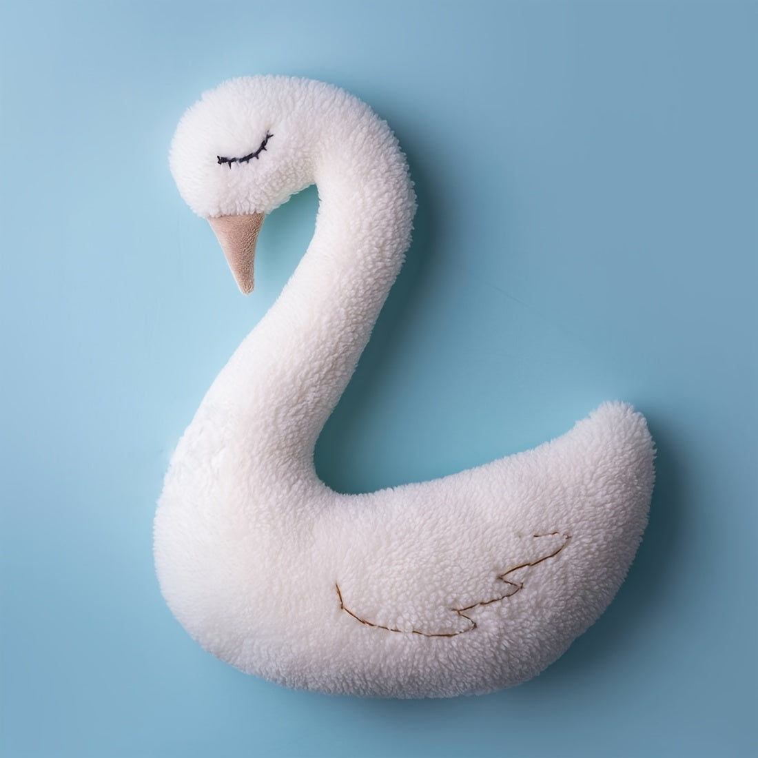 Soft animal cushion, cute photography prop featuring swan photography.