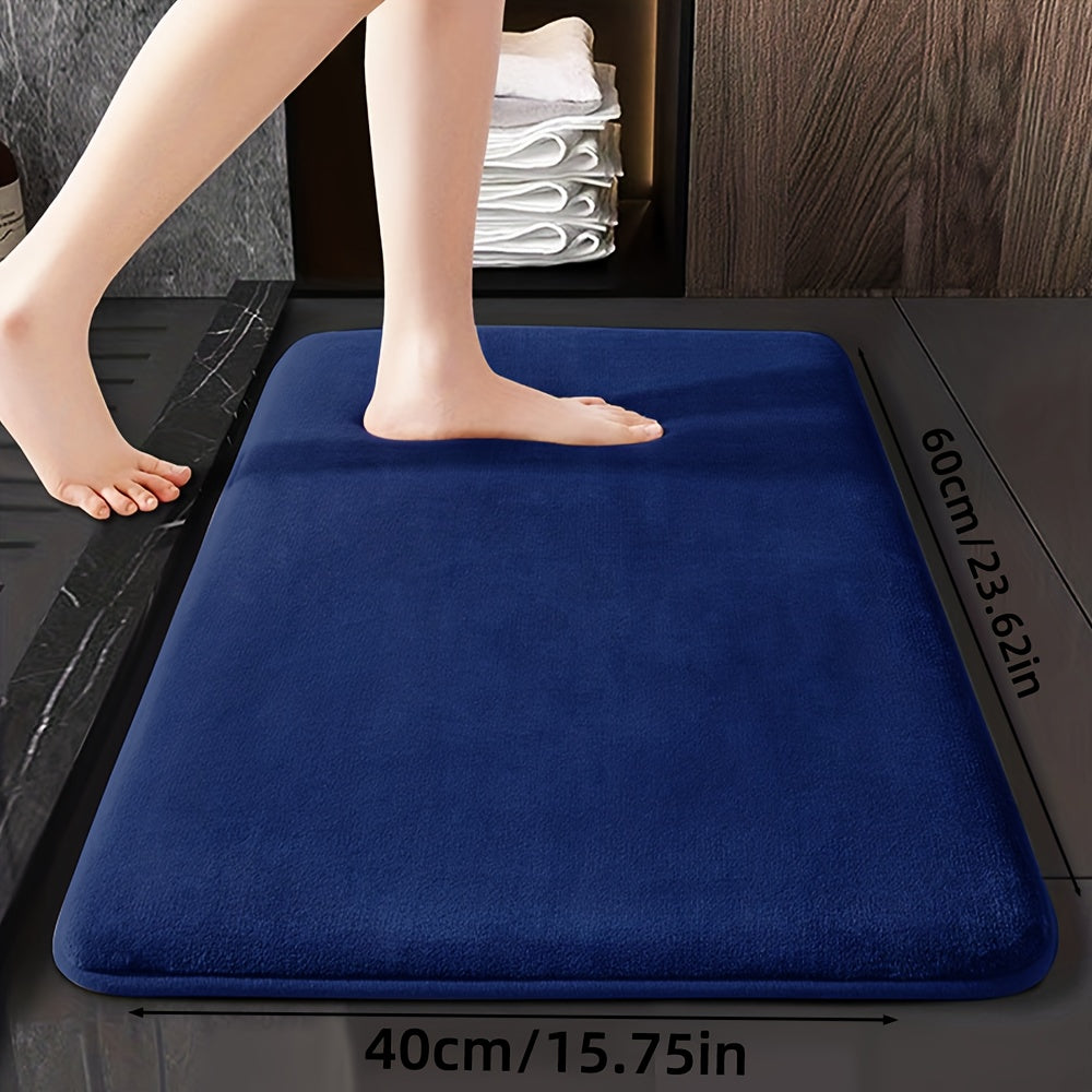 Soft and durable polyester bathroom mat with geometric design, ideal for shower, bathtub, bedroom, and living room. Versatile and non-slip, it is highly absorbent and machine washable.