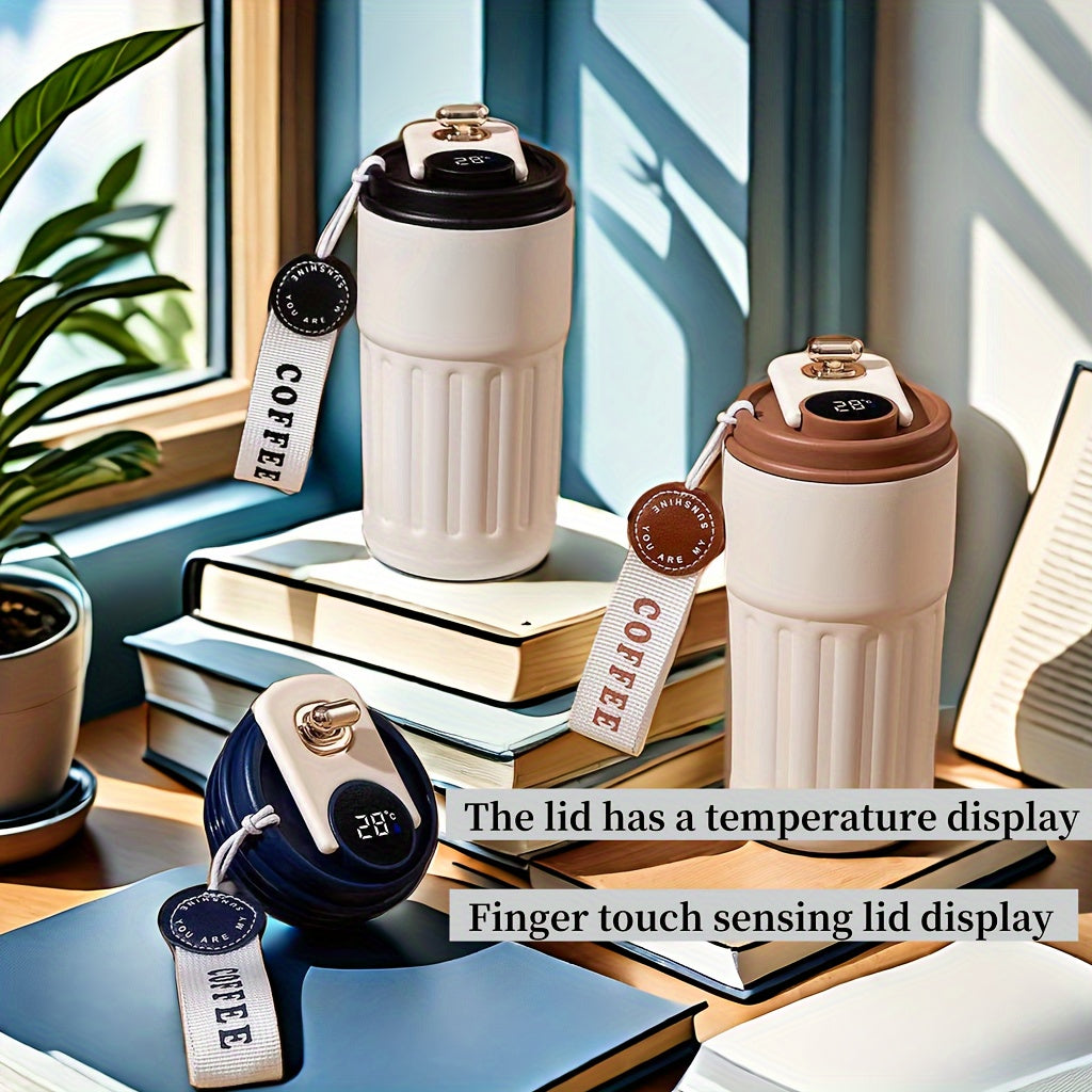 A 410ml stainless steel travel mug with temperature display, keeps beverages hot or cold, perfect for any occasion.