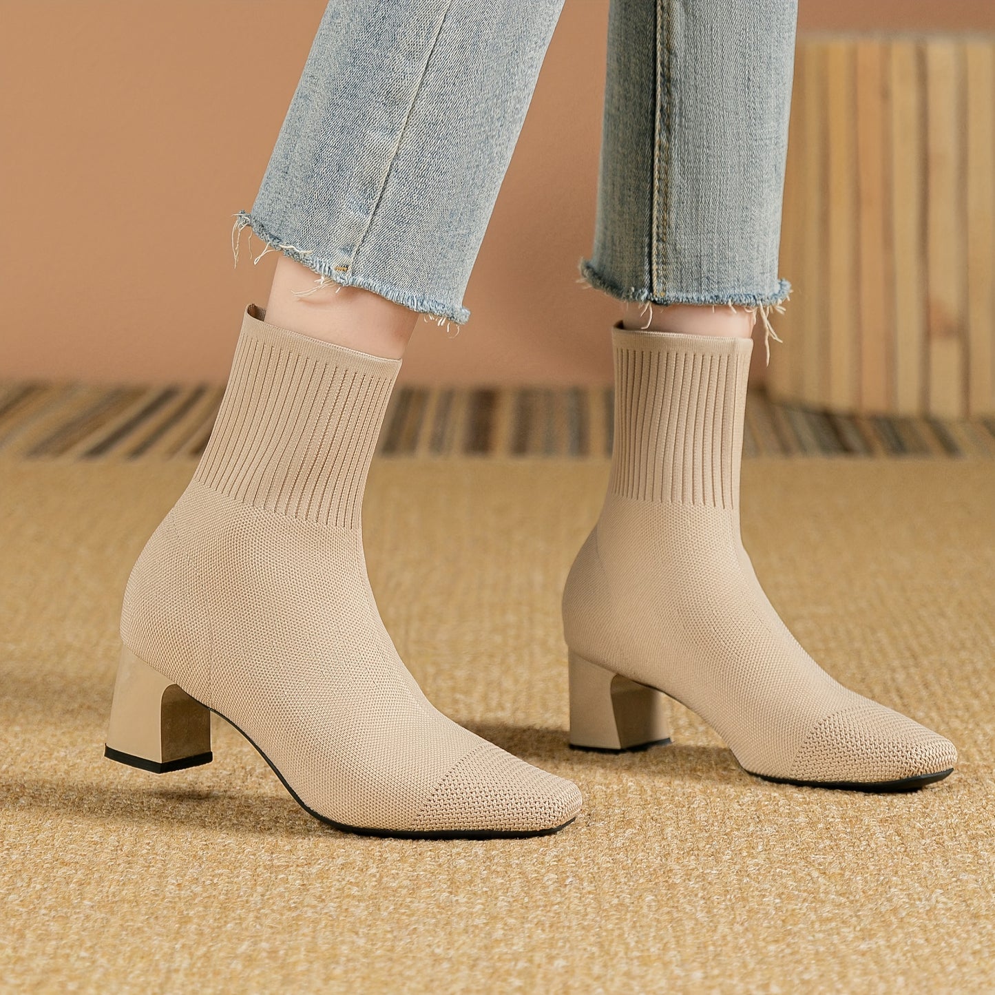 Women's square toe sock boots with high heel, solid color knit design, stretchy slip on style.