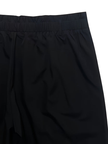 Solid wide leg pants suitable for plus size women in spring and fall with pockets and tie front detail.