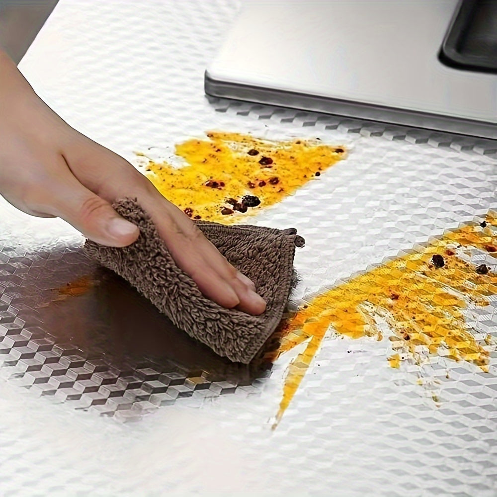 Easily clean and waterproof Silvery Hexagon Self-Adhesive Kitchen Film for Countertops and Cabinets, resistant to oil.