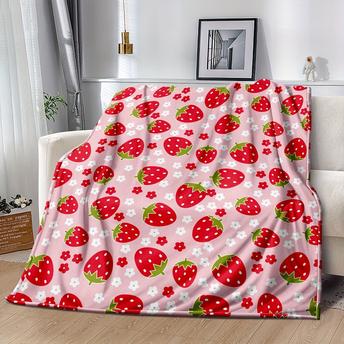 Soft and cozy pink strawberry print flannel throw blanket, perfect for all seasons. Made from 250-300g superfine fiber with digital print design. Ideal for bed or sofa, with no embellishments for a simple and elegant home decor touch.