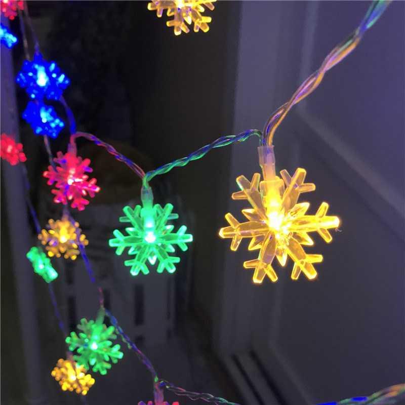 Vintage-inspired Snowflake String Lights with battery-operated white LEDs for Christmas, weddings, and gardens.