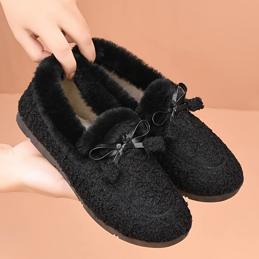 Women's cozy loafers with a solid color design, bow accent, and rubber sole. Made with microfiber upper and lining, flat head for warmth and non-slip comfort. Fashionable and cozy home