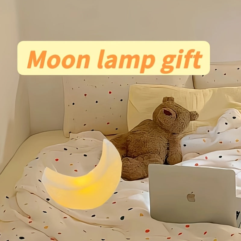 Portable Nordic-style LED moon-shaped lamp perfect for the bedroom, powered by batteries and ideal as a holiday decoration or gift.