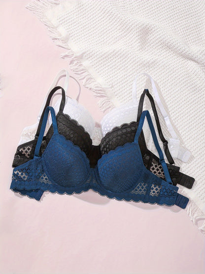 Set of 3 Elegant Lace Push-Up Bras for Women in White, Black, and Navy Blue. Sexy, Comfortable, and Breathable with Non-Removable Pads. Perfect for a Sensual and Smooth Lingerie Look.