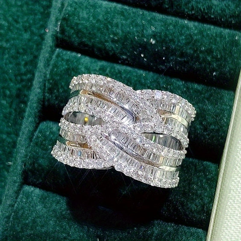 An exquisite and opulent wide-faced ring designed for women, adorned with shimmering zirconia stones, ideal for weddings, parties, anniversaries, and any special event.