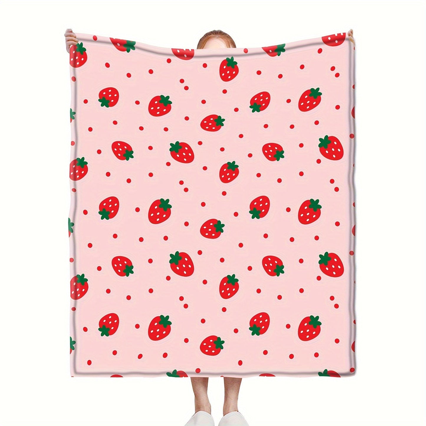 One piece of a strawberry printed throw blanket, perfect for bed, sofa, office, camping, or traveling. This soft and cozy blanket is versatile and makes a great gift for all seasons.