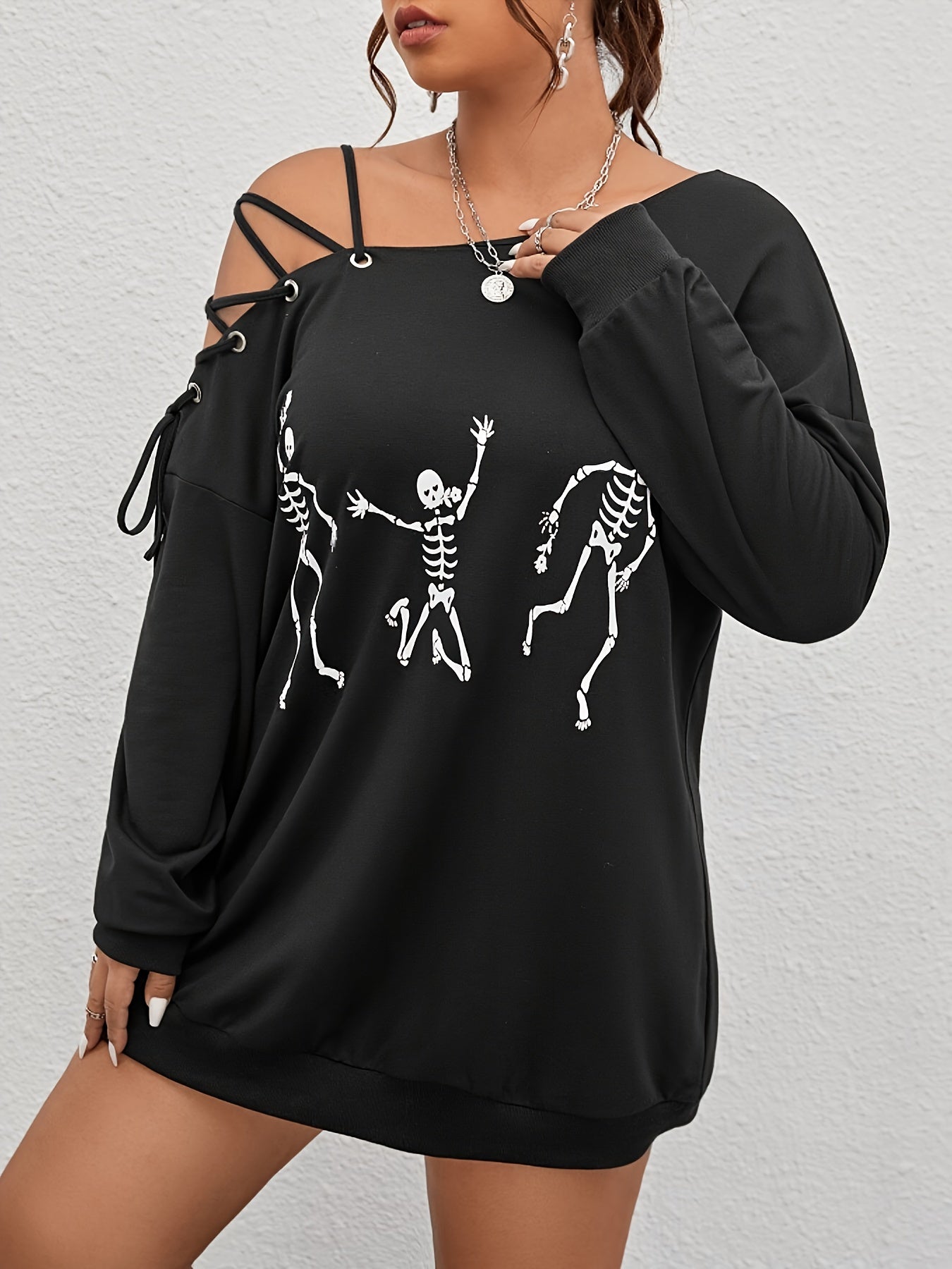 Women's Elegant Long Sleeve T-Shirt made with polyester fabric, has a relaxed fit, and is machine washable.